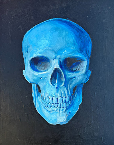 Bright blue human skull facing forward against a dark blue-gray background.